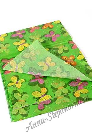 Бумага тишью бабочки на зеленом